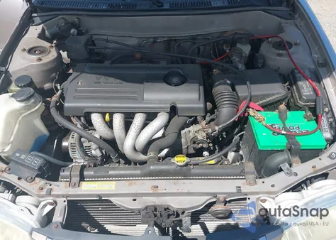 2002 Toyota Corolla Le from USA, damaged, VIN 2T1BR12E72C537034